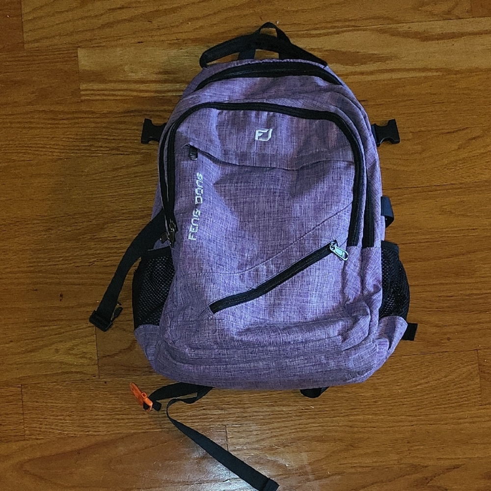 Purple Backpack by Feng Dong